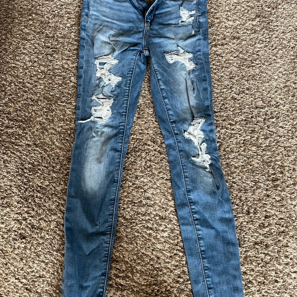 Women's Distressed Blue Jeans